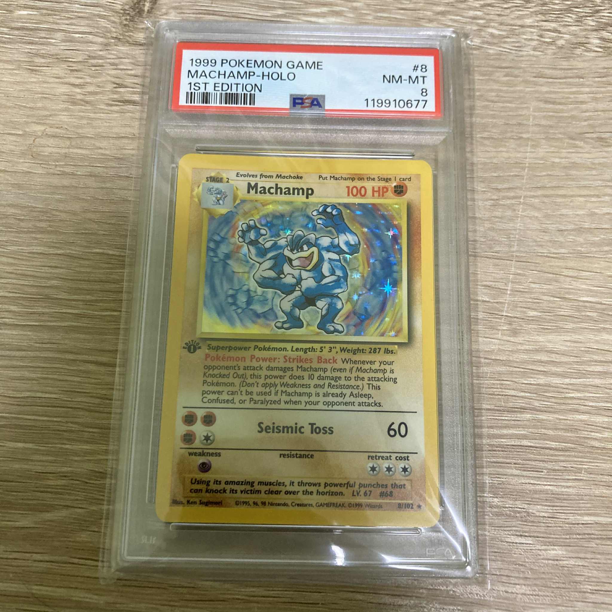Machamp (8/102) (Shadowed Border) [Base Set 1st Edition] PSA 8 (119910677) Graded Card