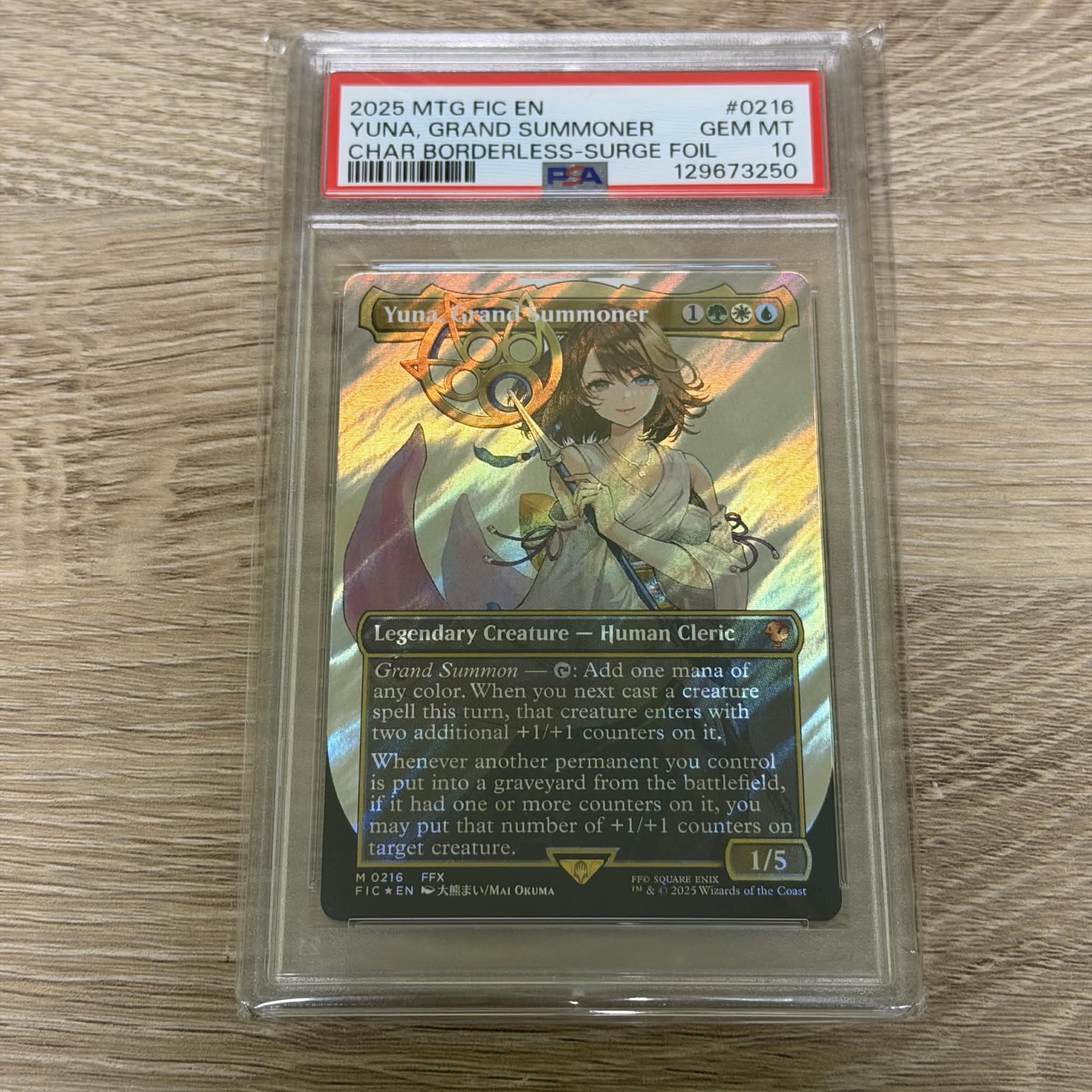 Yuna, Grand Summoner (Borderless) (Surge Foil) [FINAL FANTASY Commander] PSA 10 (129673250) Graded Card